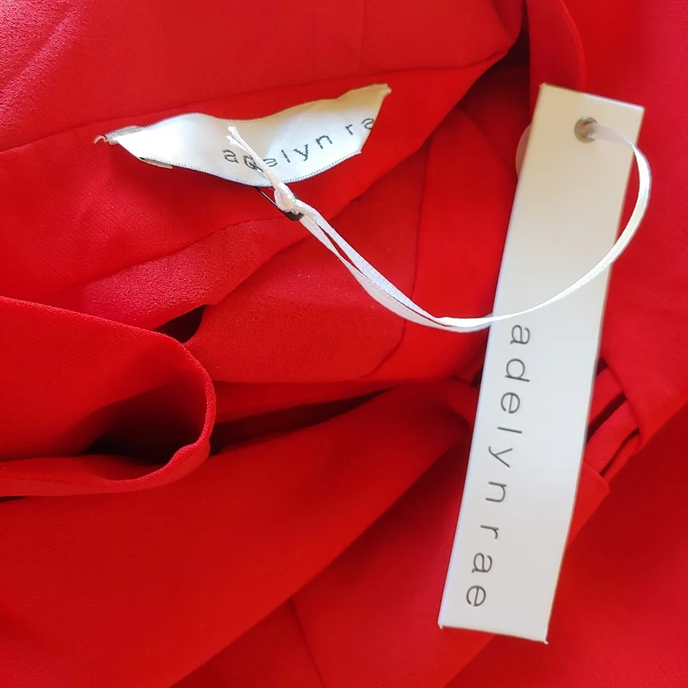 Adelyn Rae Red long sleeves jumpsuit slimly cut open back size small